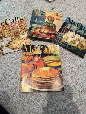 4 Vintage McCall’s soft covered cookbooks.